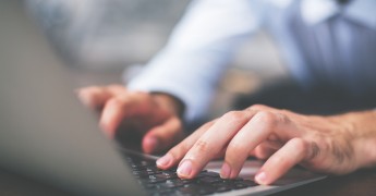 Hand using keyboard