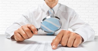 Audit, magnifying glass